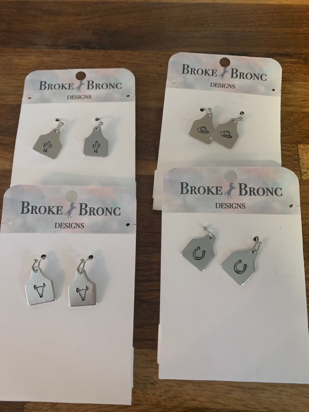 Broke Bronc Cow Tag Earrings